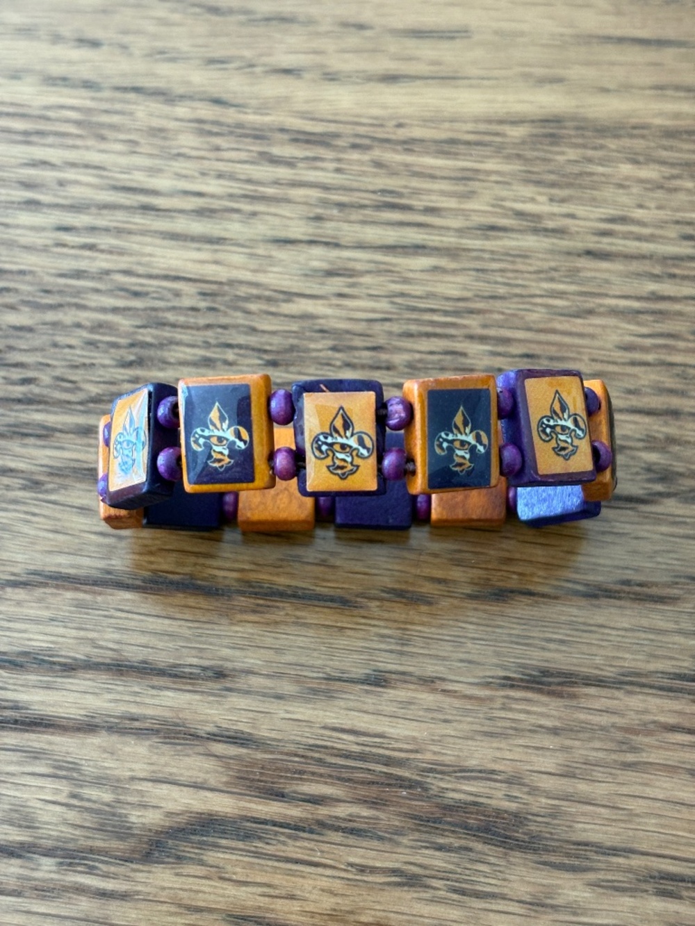 LSU Tigers Purple Gold Wooden Stretch Bracelet Fleur de Lis Tiger Stripe EUC